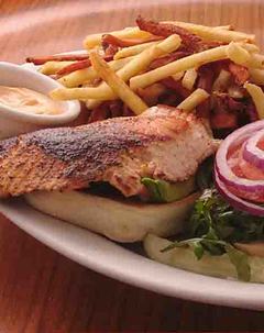 Salmon sandwich with fries